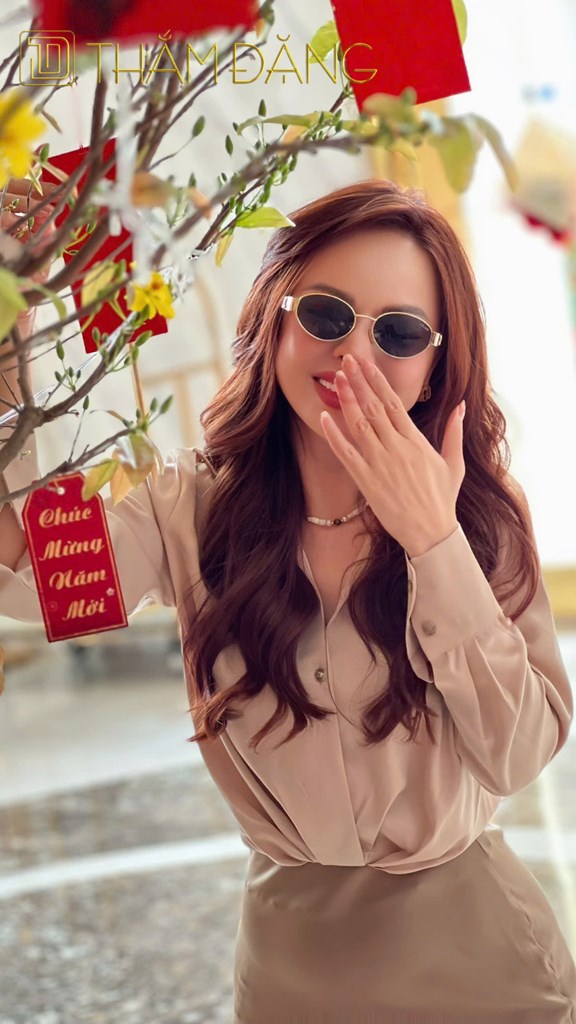 image Áo kiểu cổ sơmi, tay dài, có dây kéo ở bên hông eo 2