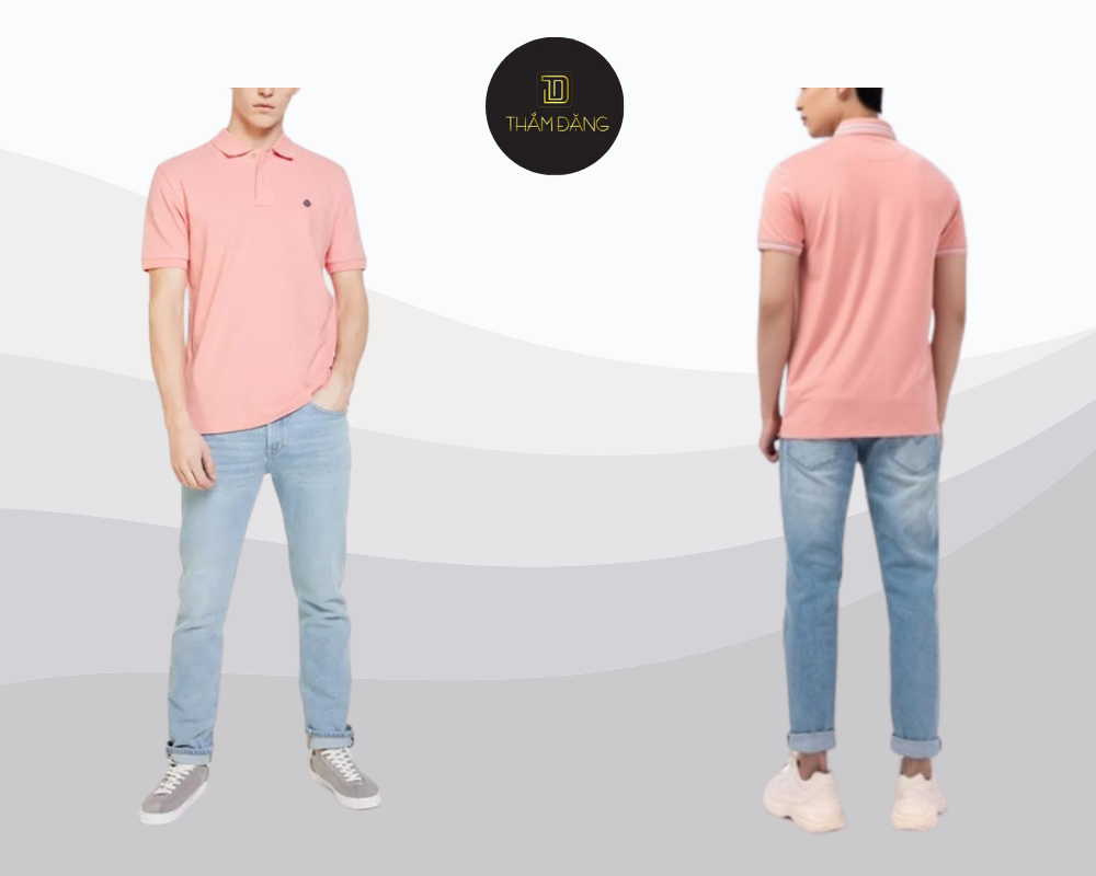 Áo hồng cam kết hợp quần jean xanh và giày thể thao trắng mang đến vẻ ngoài trẻ trung, năng động mà vẫn đầy nam tính.