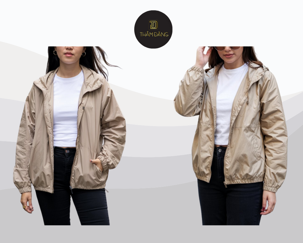 ​​Áo khoác dù tan phối quần jeans đen và áo thun trắng mang đến phong cách năng động, thanh lịch cho mọi dịp.